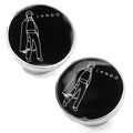 Close up of black and white Lando Calrissian enamel cufflinks with Star Wars logo backing.