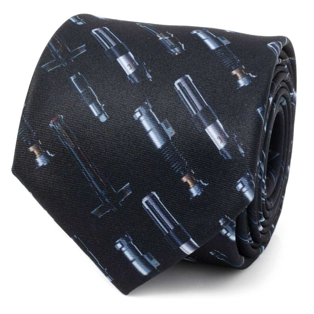 Close up of a black necktie featuring a repeating print of various Star Wars lightsaber hilts.