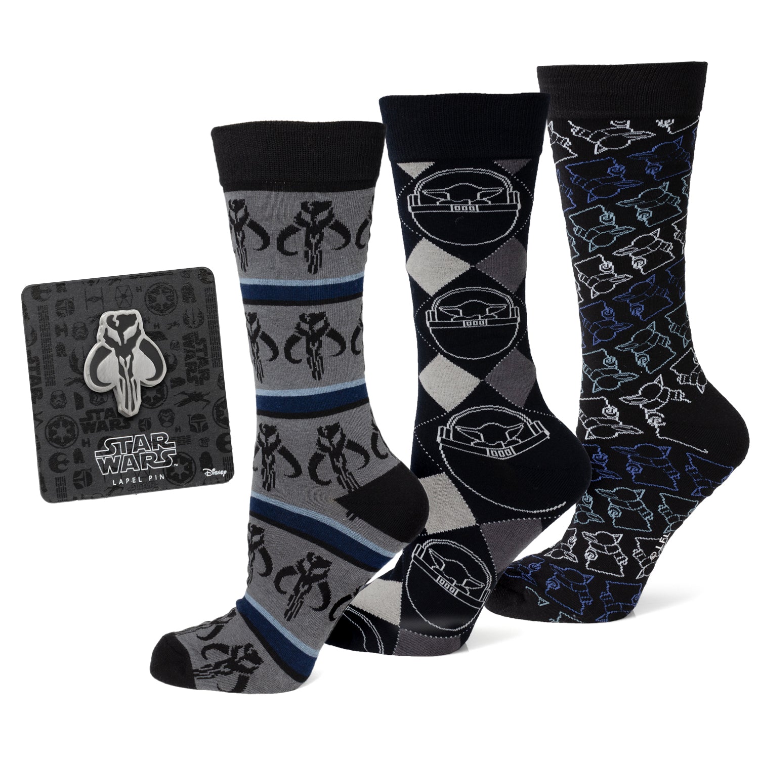 Three pairs of Star Wars Mandalorian dress socks including Mythosaur and Grogu designs next to a Mythosaur lapel pin.