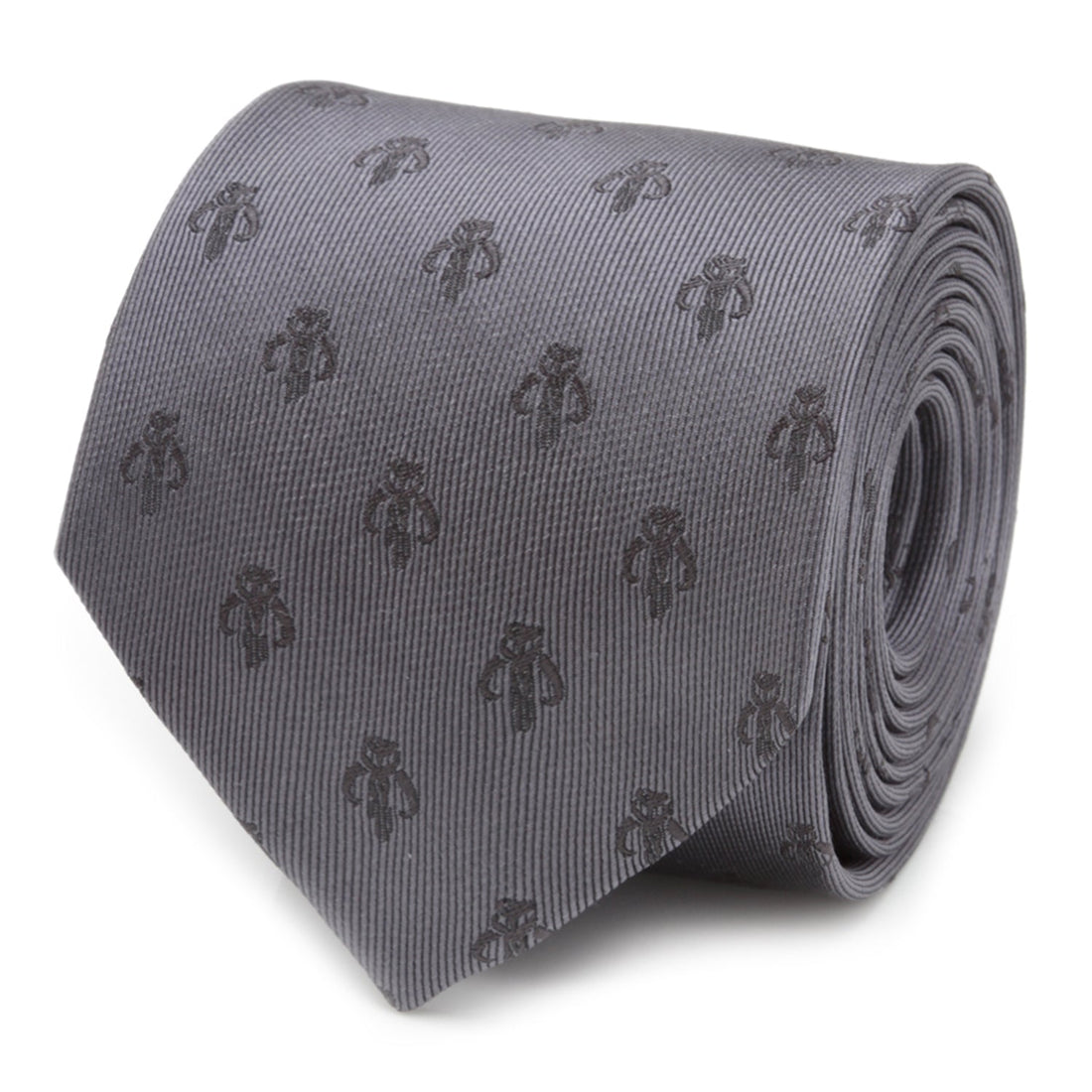 A close-up view of a slate gray silk tie featuring a repeating dark gray Mandalorian Mythosaur skull pattern.