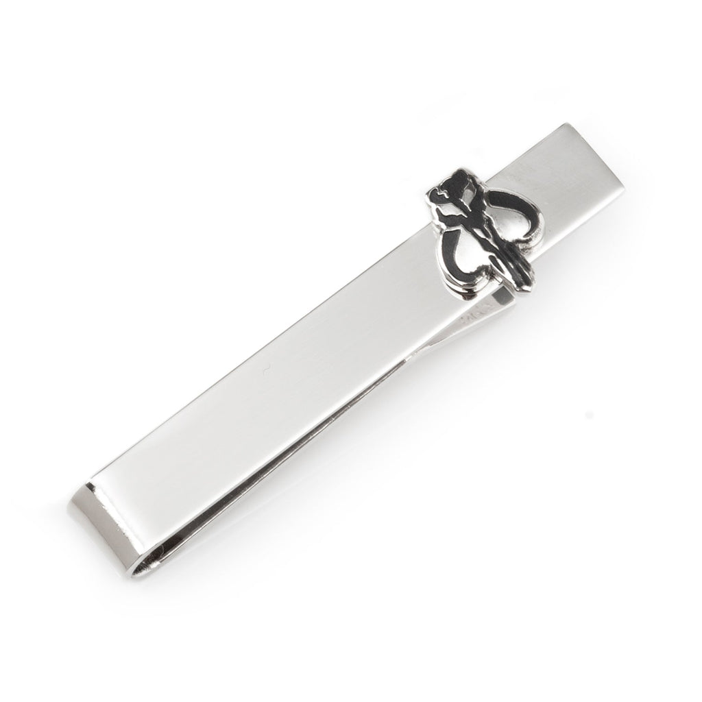 Silver tone Star Wars Mandalorian Mythosaur tie bar on a grey patterned tie.