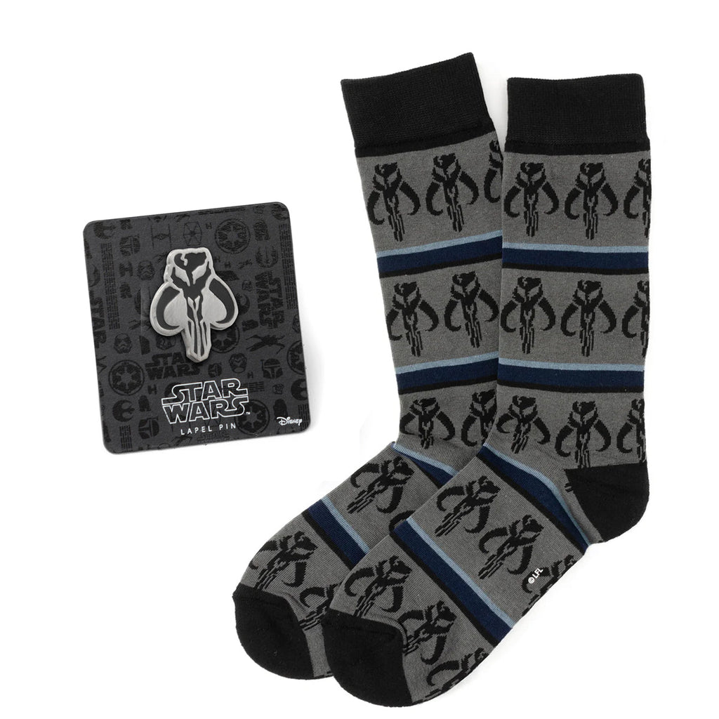 Star Wars Mandalorian Mythosaur striped crew socks in grey, blue, and black with a matching silver enamel lapel pin.