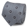 Close up and full length view of a black and grey herringbone silk tie featuring small Millennium Falcon ship icons.