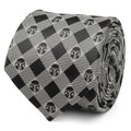 A rolled black and gray plaid tie featuring small Star Wars Mandalorian helmet icons.