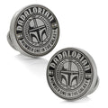A pair of round Star Wars Dadalorian themed cufflinks featuring a helmet design and text Number One In The Galaxy with a Mythosaur logo on the backing.