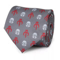 Charcoal gray Star Wars Mandalorian neck tie with red Mythosaur and silver helmet icons