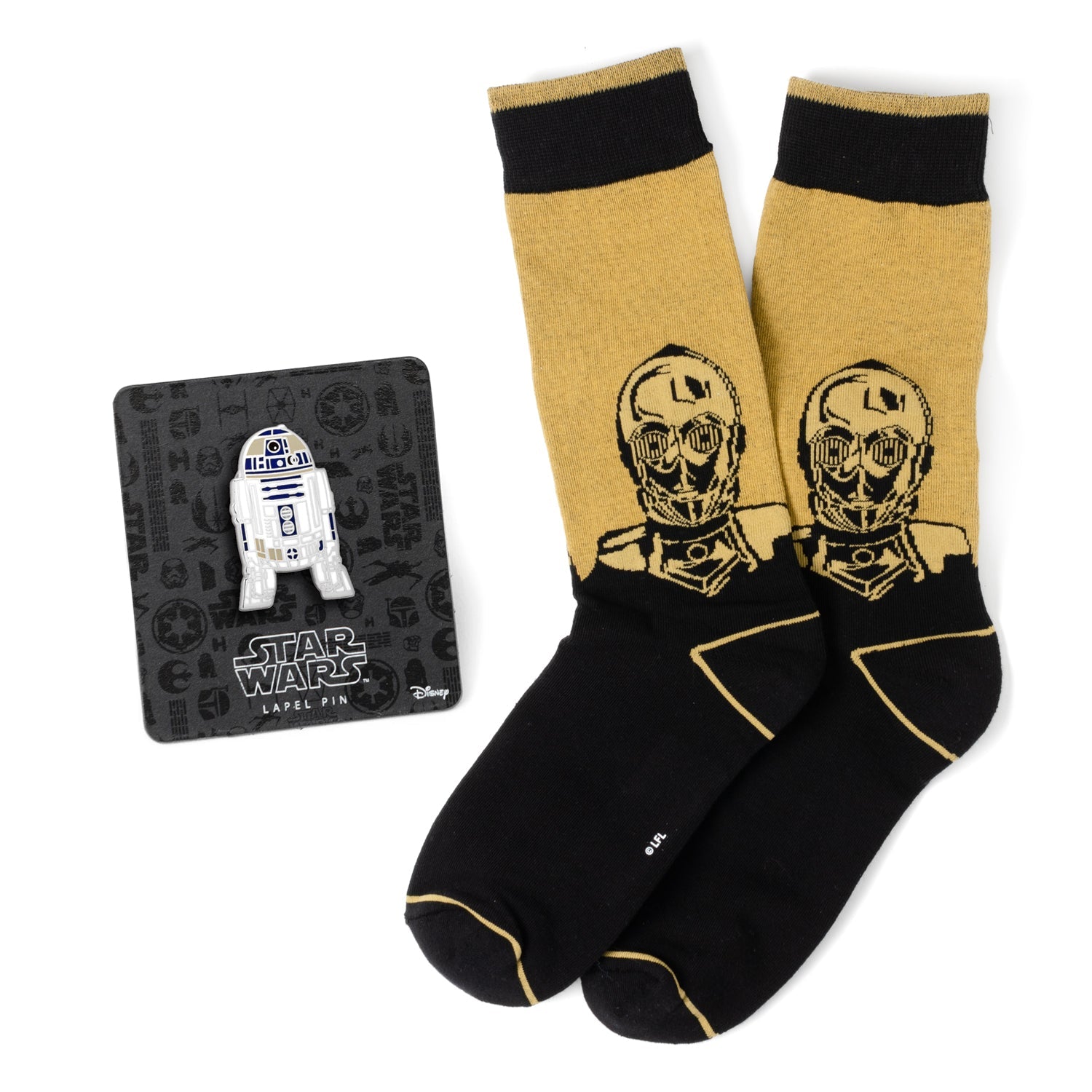 Star Wars C-3PO crew socks in black and gold paired with an R2-D2 metal lapel pin on a display card.