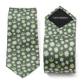 Close up and worn view of a green Star Wars necktie with shamrock and Rebel Alliance logo pattern