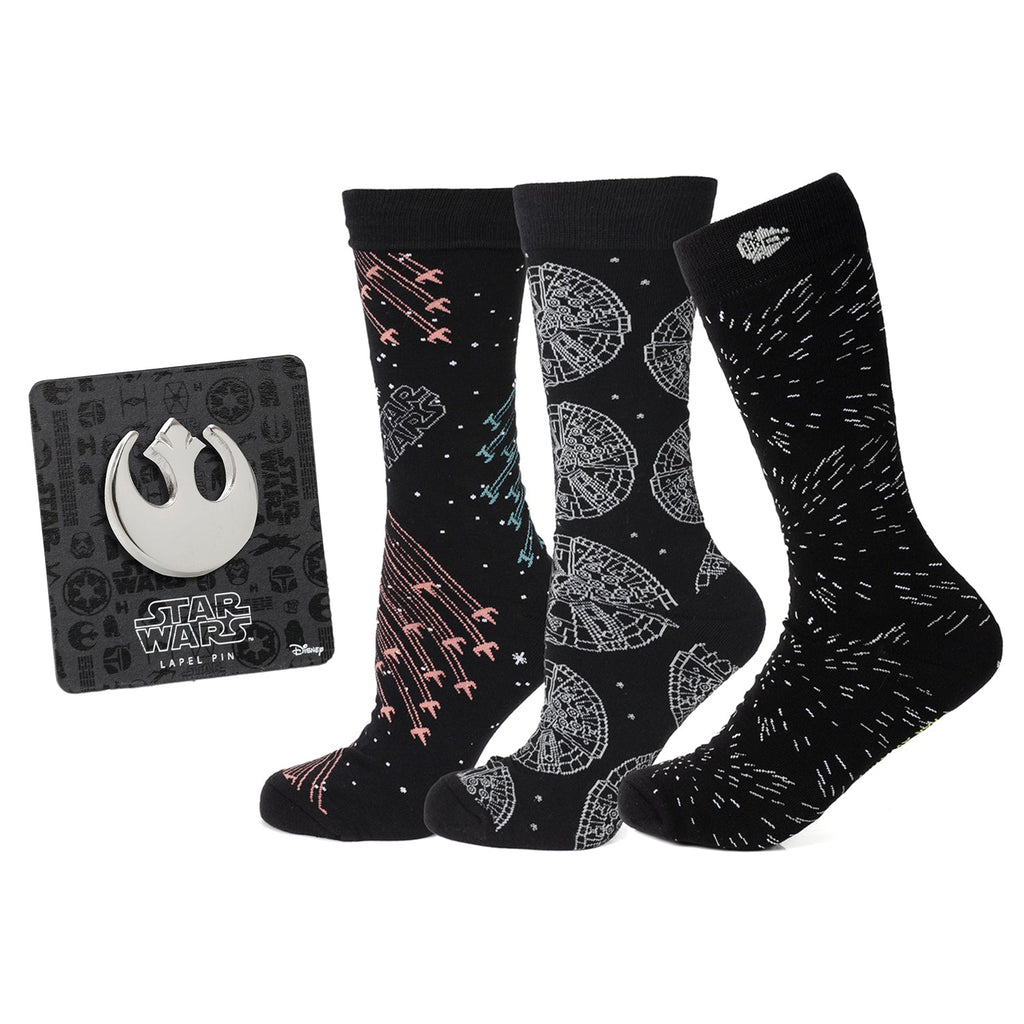 A gift set containing three pairs of black Star Wars themed crew socks and one silver Rebel Alliance lapel pin on a display card.