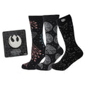 A gift set containing three pairs of black Star Wars themed crew socks and one silver Rebel Alliance lapel pin on a display card.