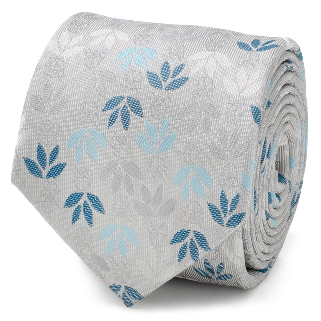 Close up of a gray silk tie with a hidden Darth Vader and floral pattern in blue and light blue.