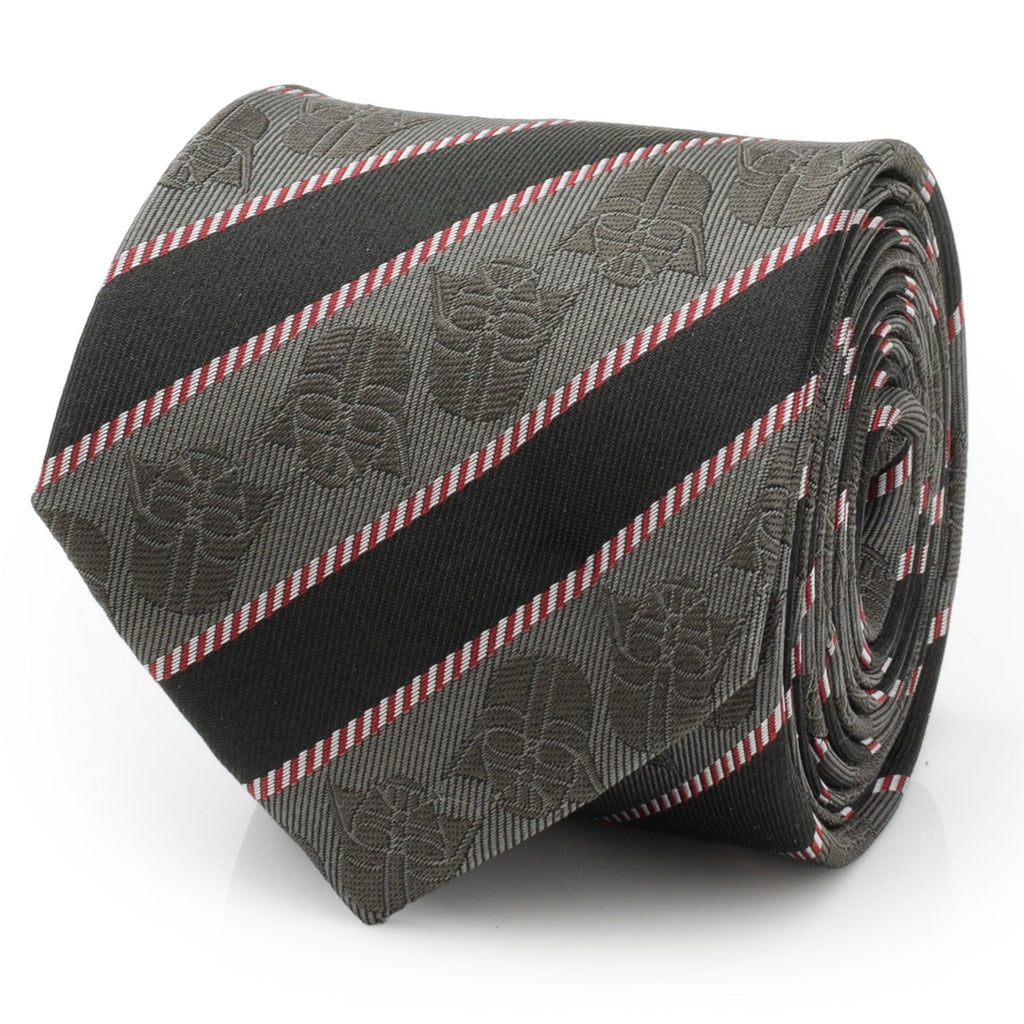 A close-up of a black and gray striped tie featuring a subtle Darth Vader helmet pattern and a red and white pinstripe detail.
