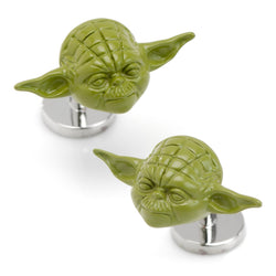 A pair of 3D Yoda head cufflinks in green with silver-toned base metal backings on a white background.