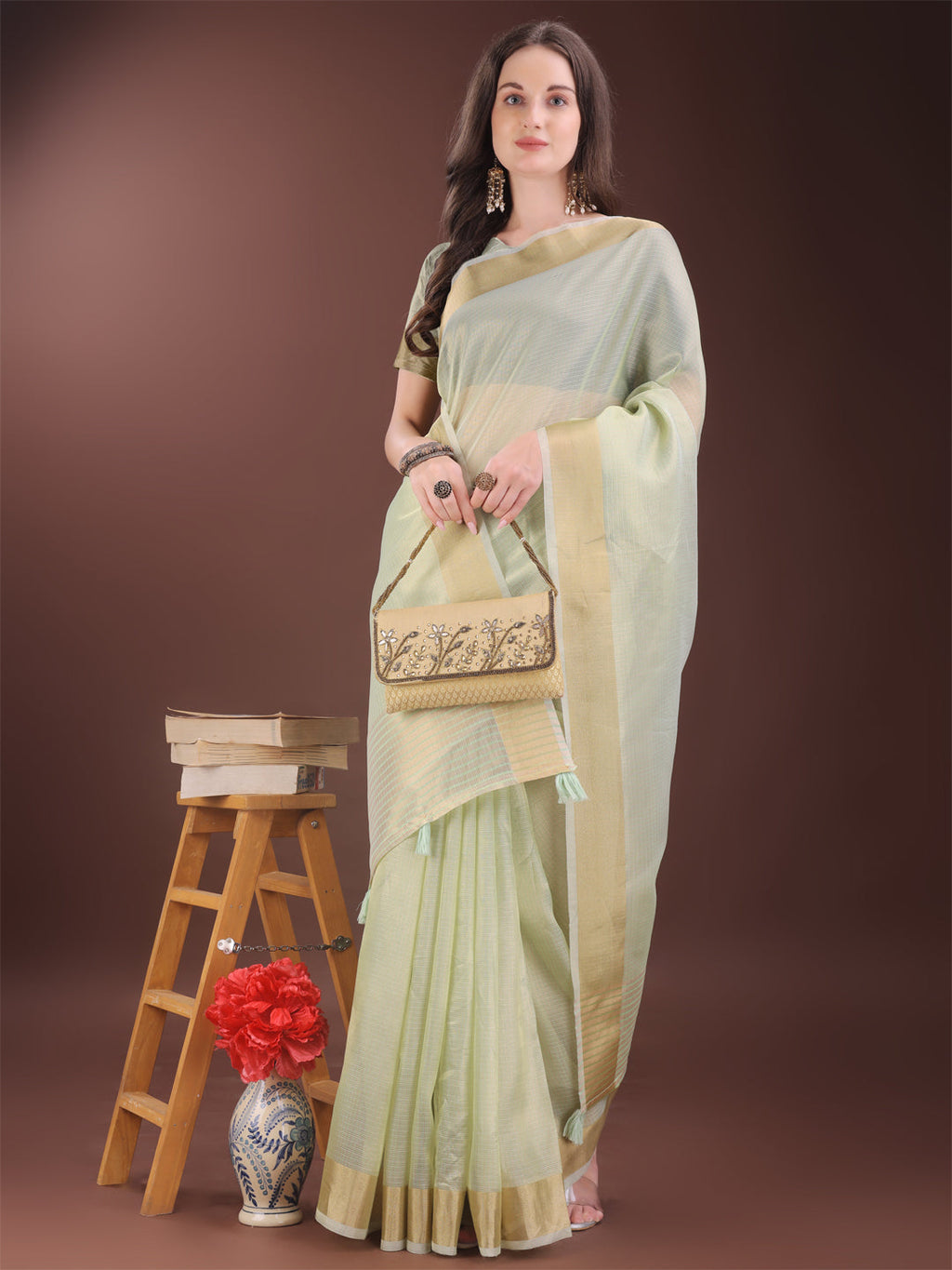 Light Green Organza Saree with Golden Zari Border