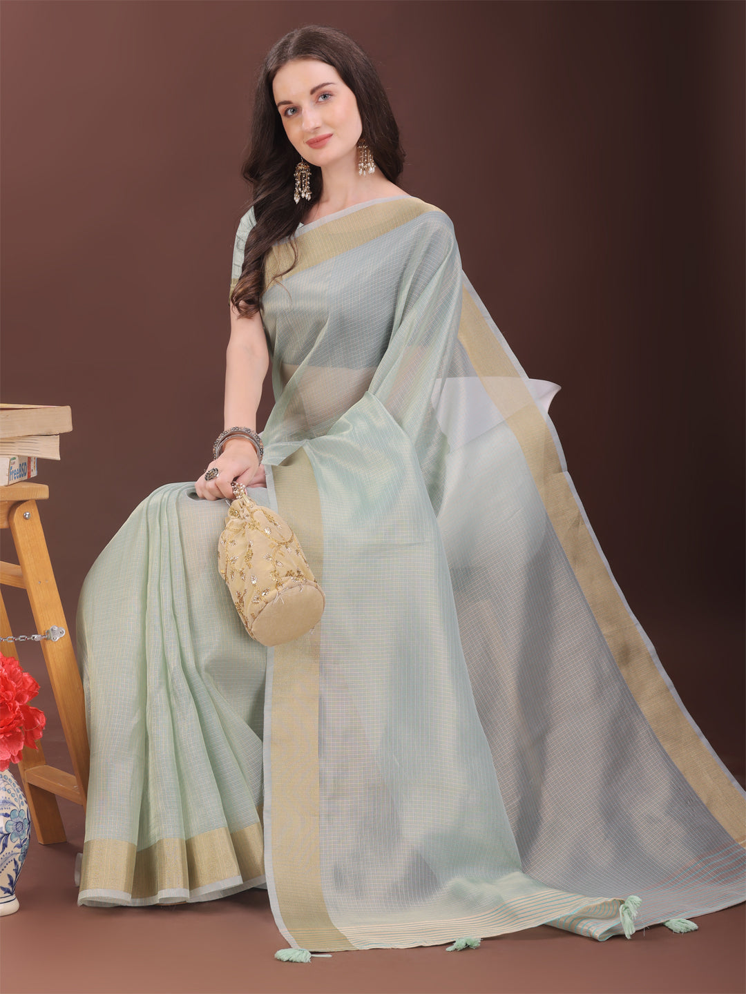 Sky Blue Organza Saree with Golden Zari Border