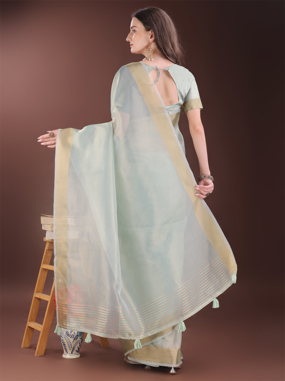 Sky Blue Organza Saree with Golden Zari Border