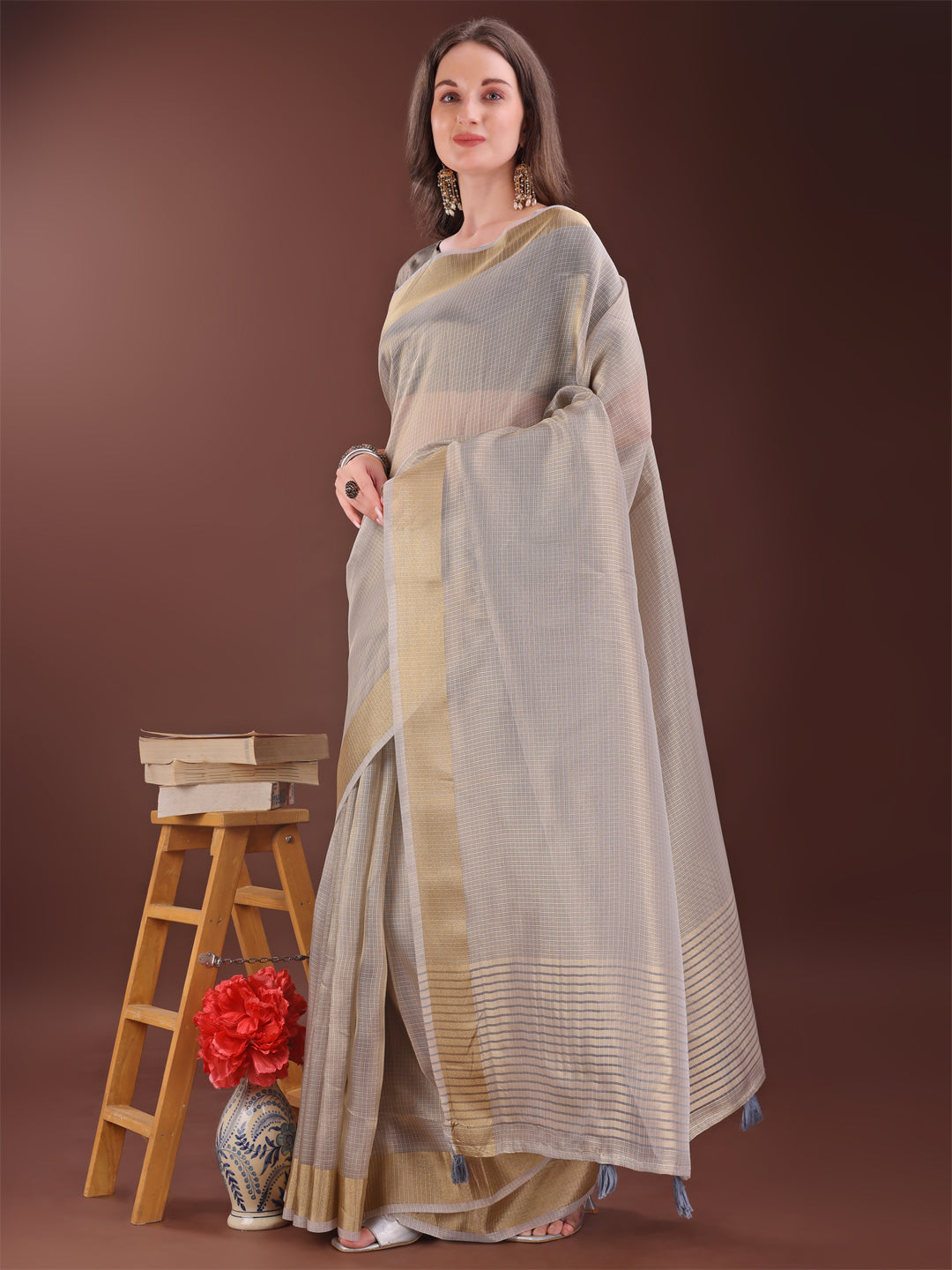 Elegant Brown Organza Saree with Rich Golden Zari Border
