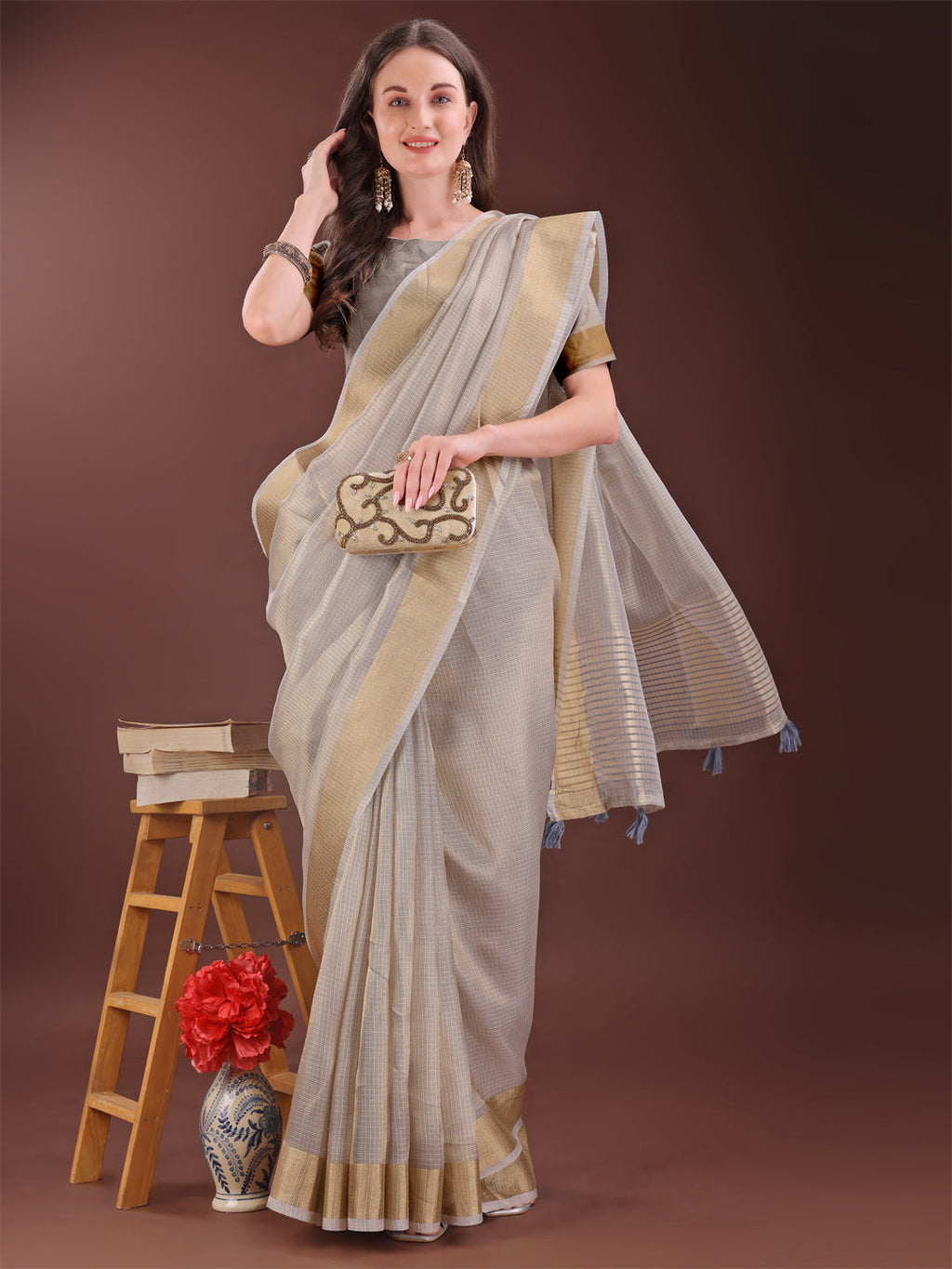 Elegant Brown Organza Saree with Rich Golden Zari Border