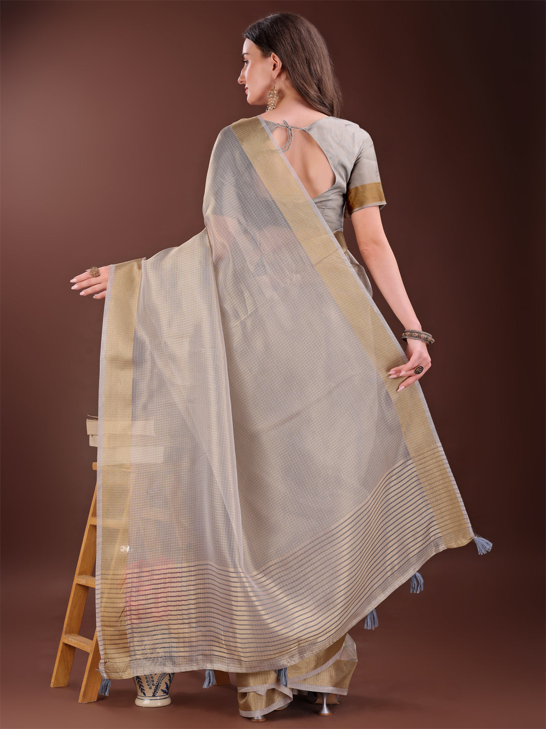 Elegant Brown Organza Saree with Rich Golden Zari Border
