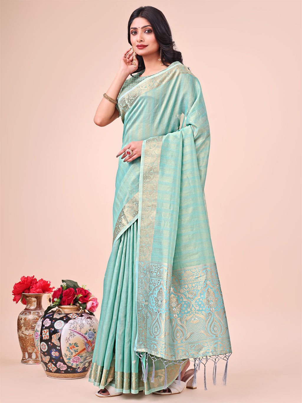 Teal Organza Saree with Traditional Zari Motifs