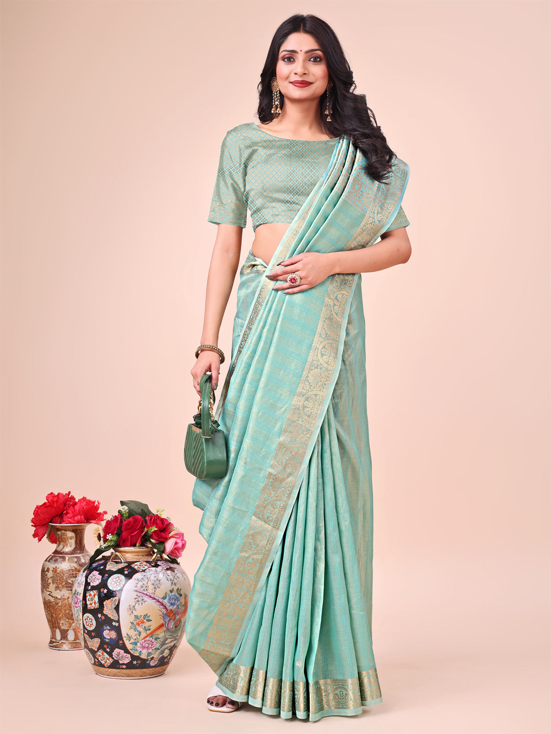 Teal Organza Saree with Traditional Zari Motifs