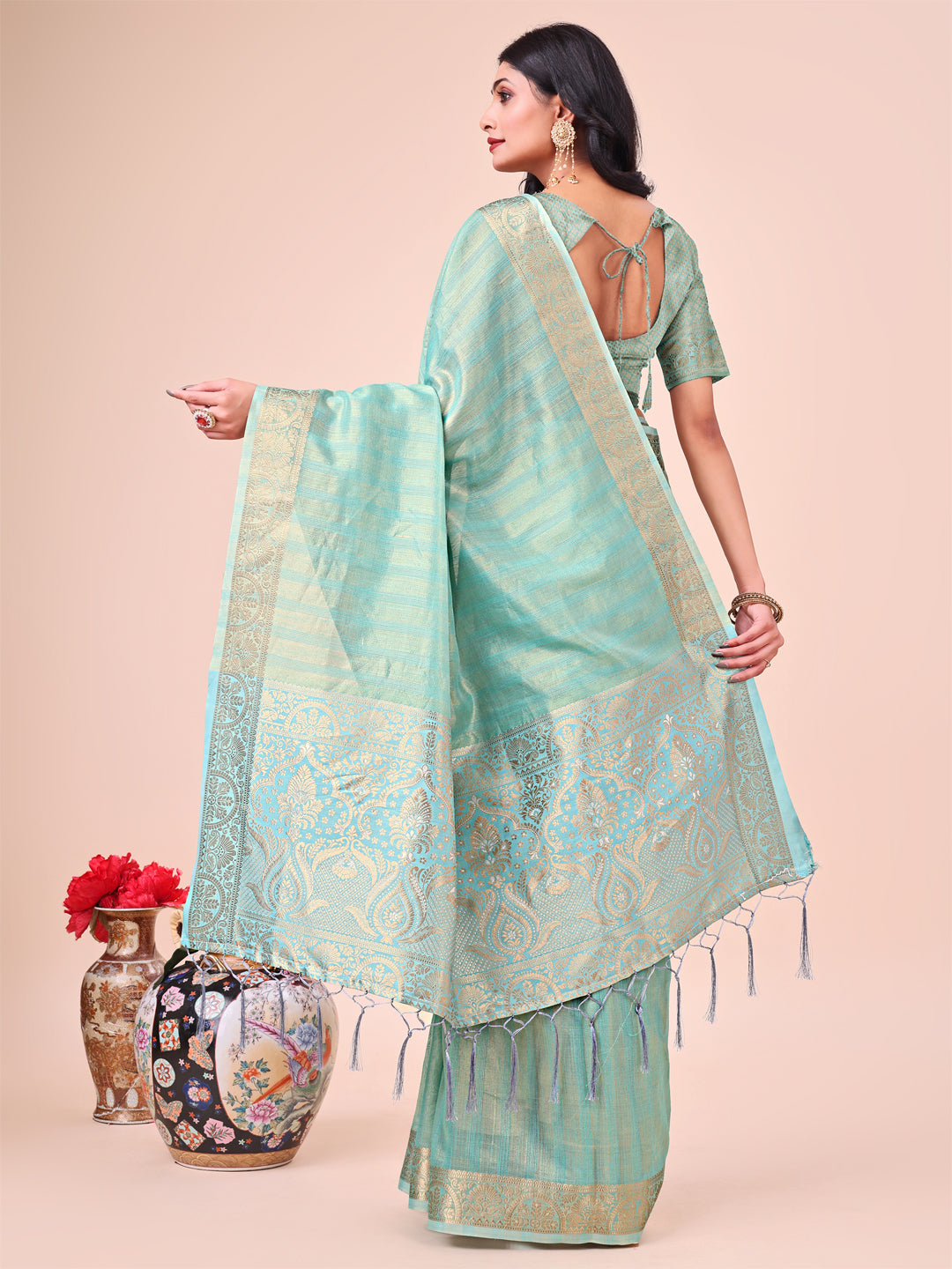 Teal Organza Saree with Traditional Zari Motifs