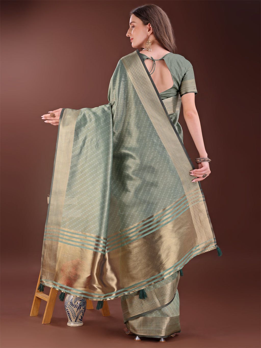 Green Organza Saree with Rich Golden Zari Border