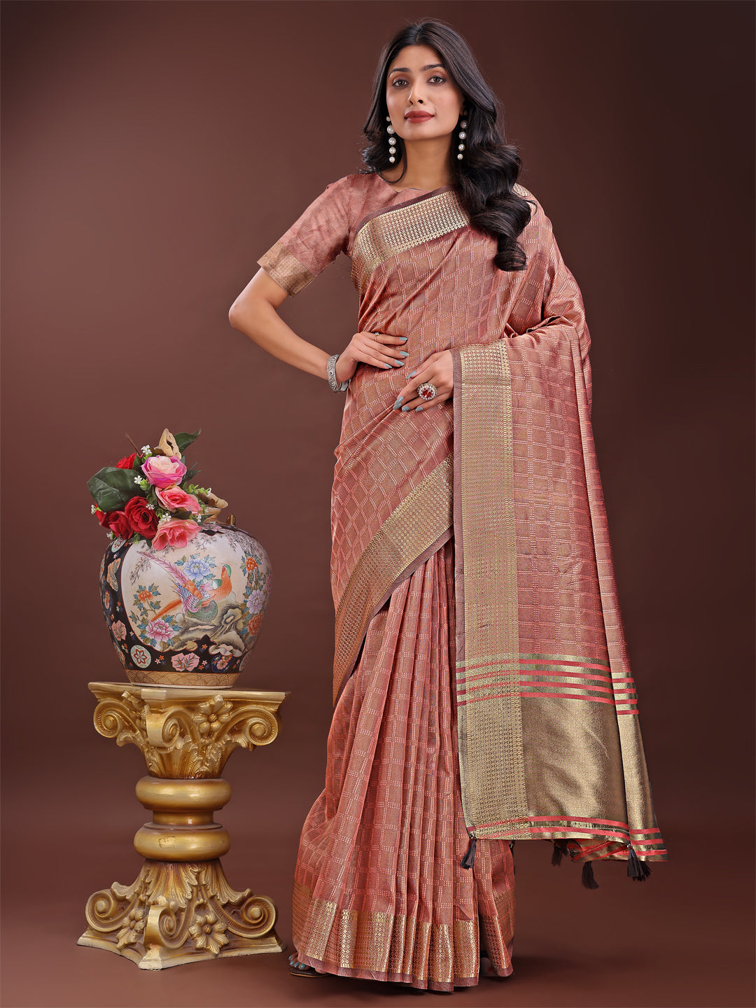 Peach organza saree with elegant golden zari border and included blouse piece