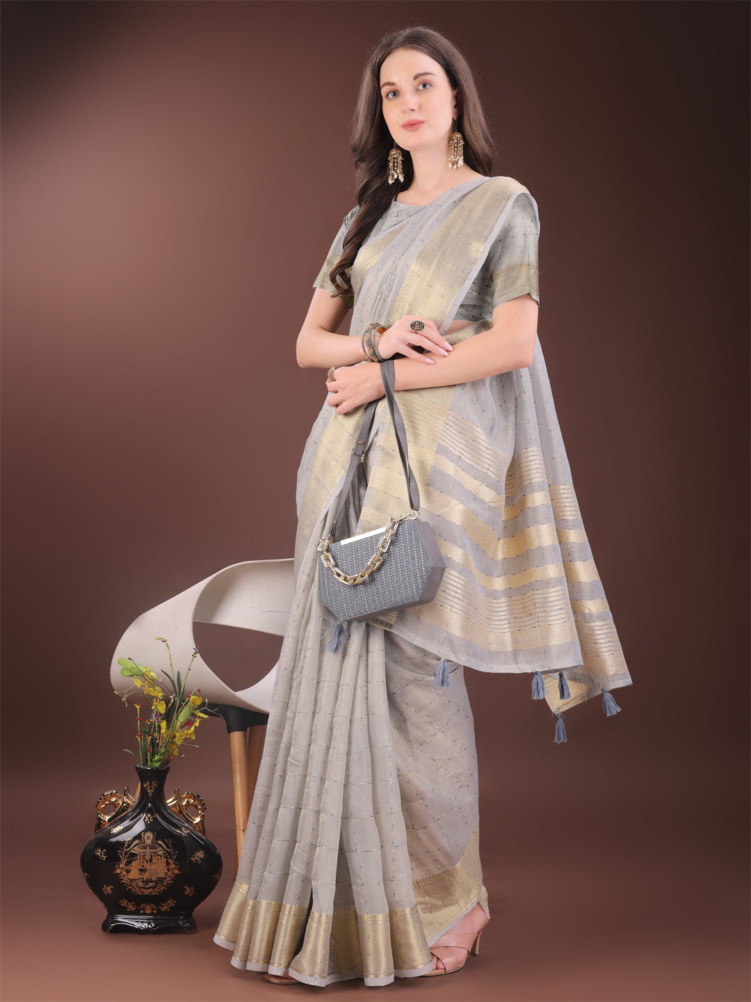 Elegant Grey Organza Saree with Golden Zari Border and Tassels