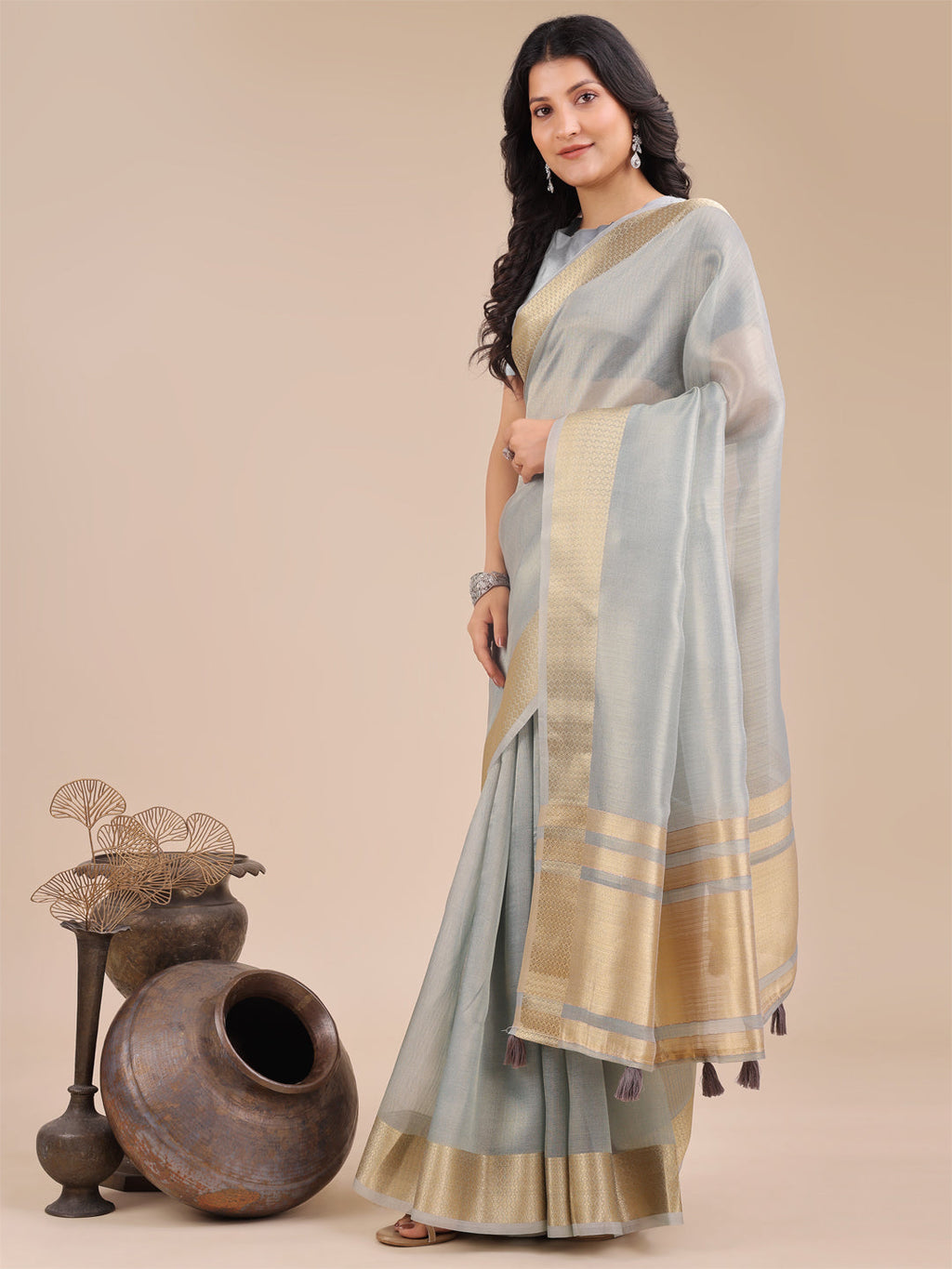 Sky Blue Organza Saree with Woven Zari Work and Tassels
