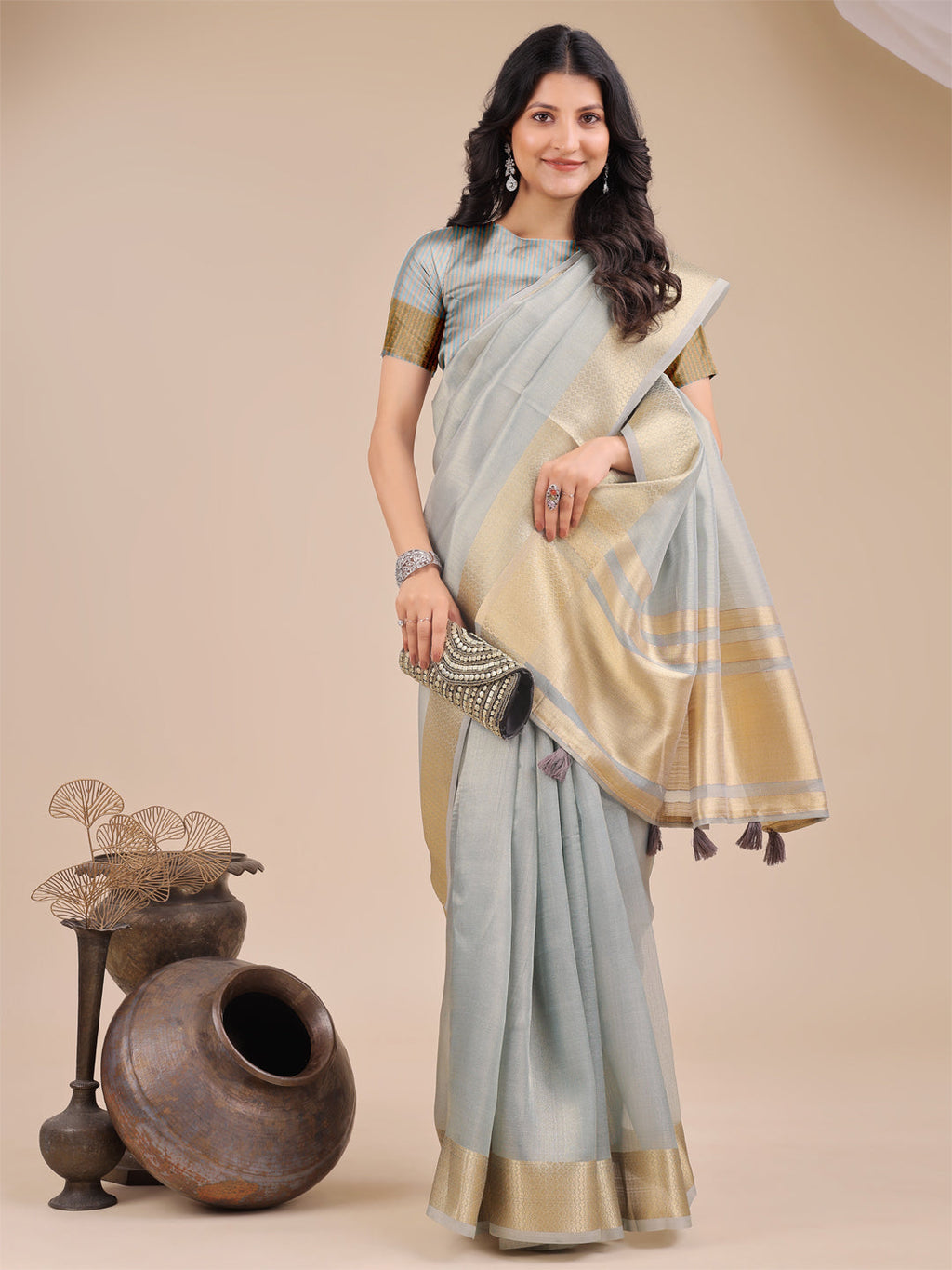 Sky Blue Organza Saree with Woven Zari Work and Tassels