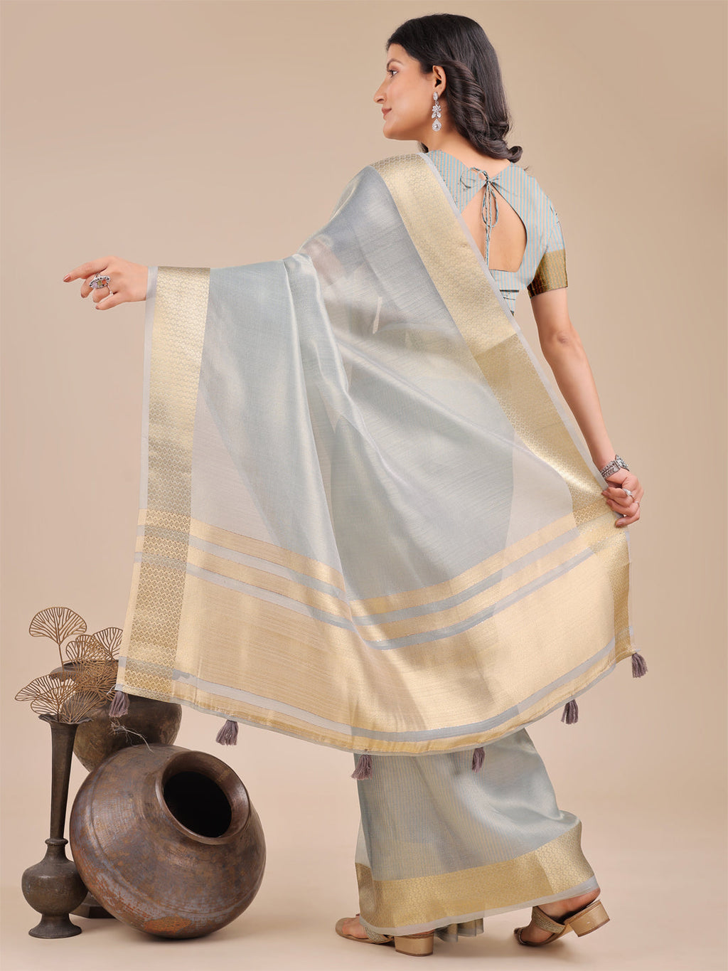 Sky Blue Organza Saree with Woven Zari Work and Tassels