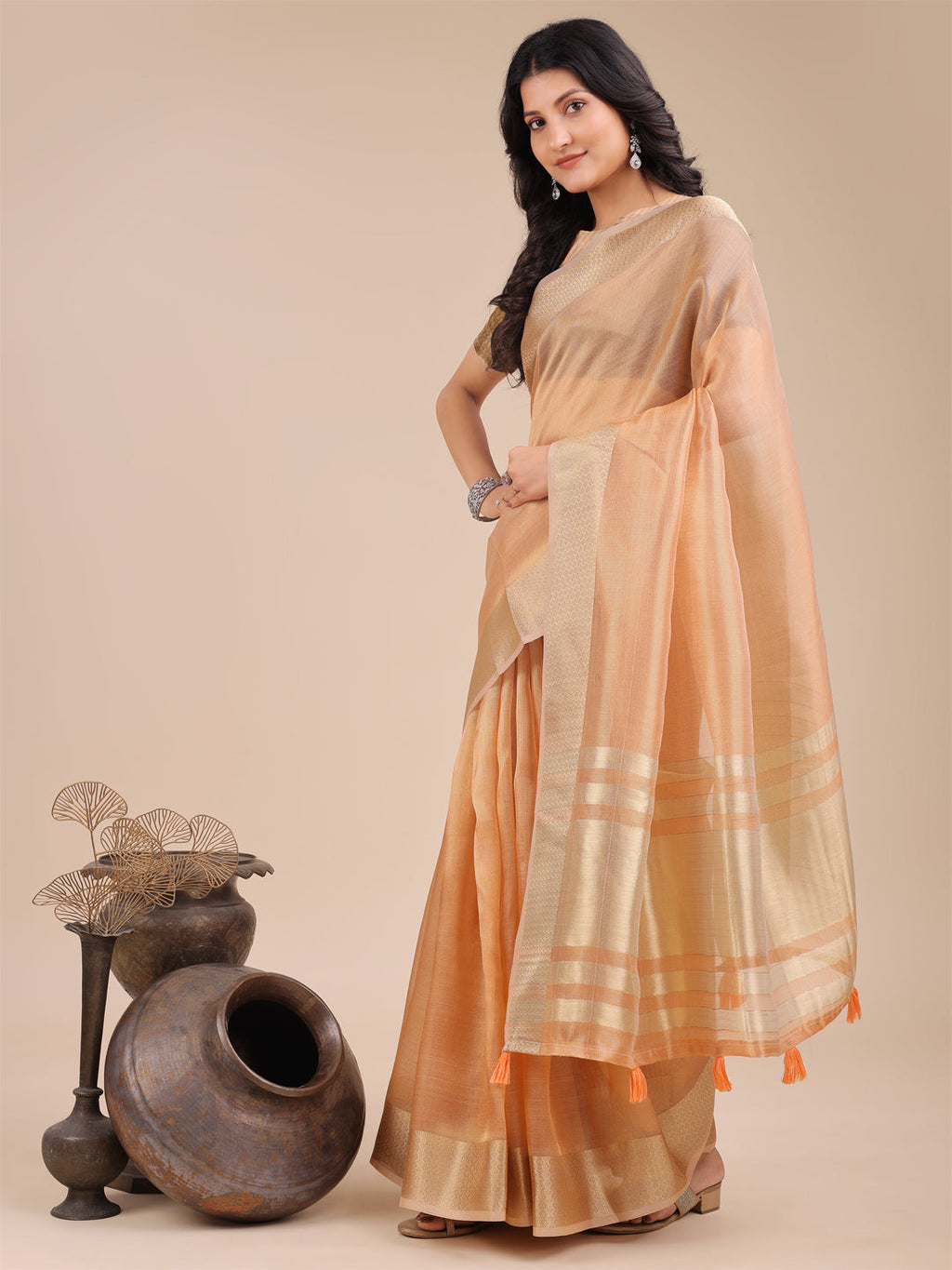 Orange Organza Saree with Woven Zari Work and Traditional Tassels