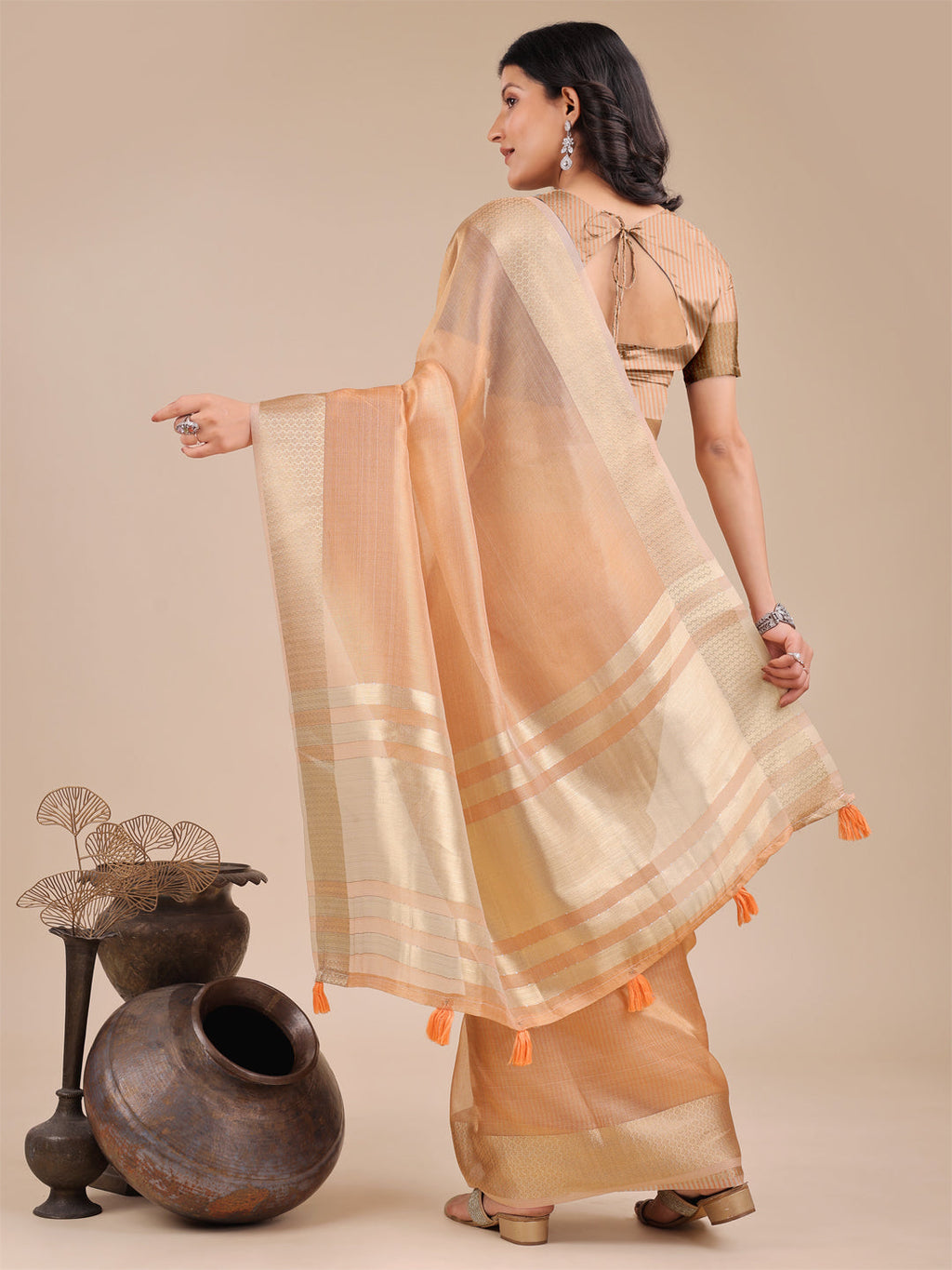 Orange Organza Saree with Woven Zari Work and Traditional Tassels