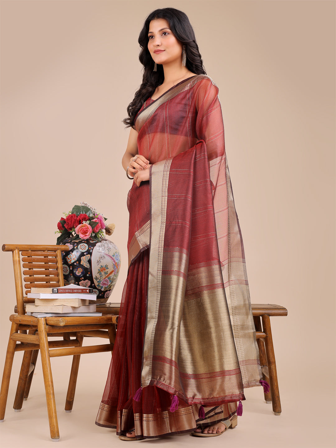 Maroon Organza Saree with Woven Zari Work and Tassel Details