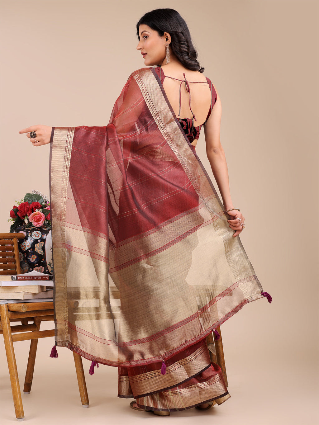 Maroon Organza Saree with Woven Zari Work and Tassel Details