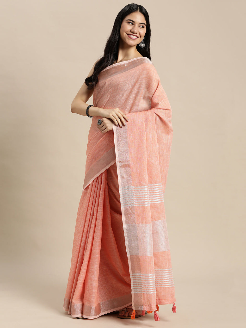 Peach Linen Saree with Contrast Zari Border and Tassels