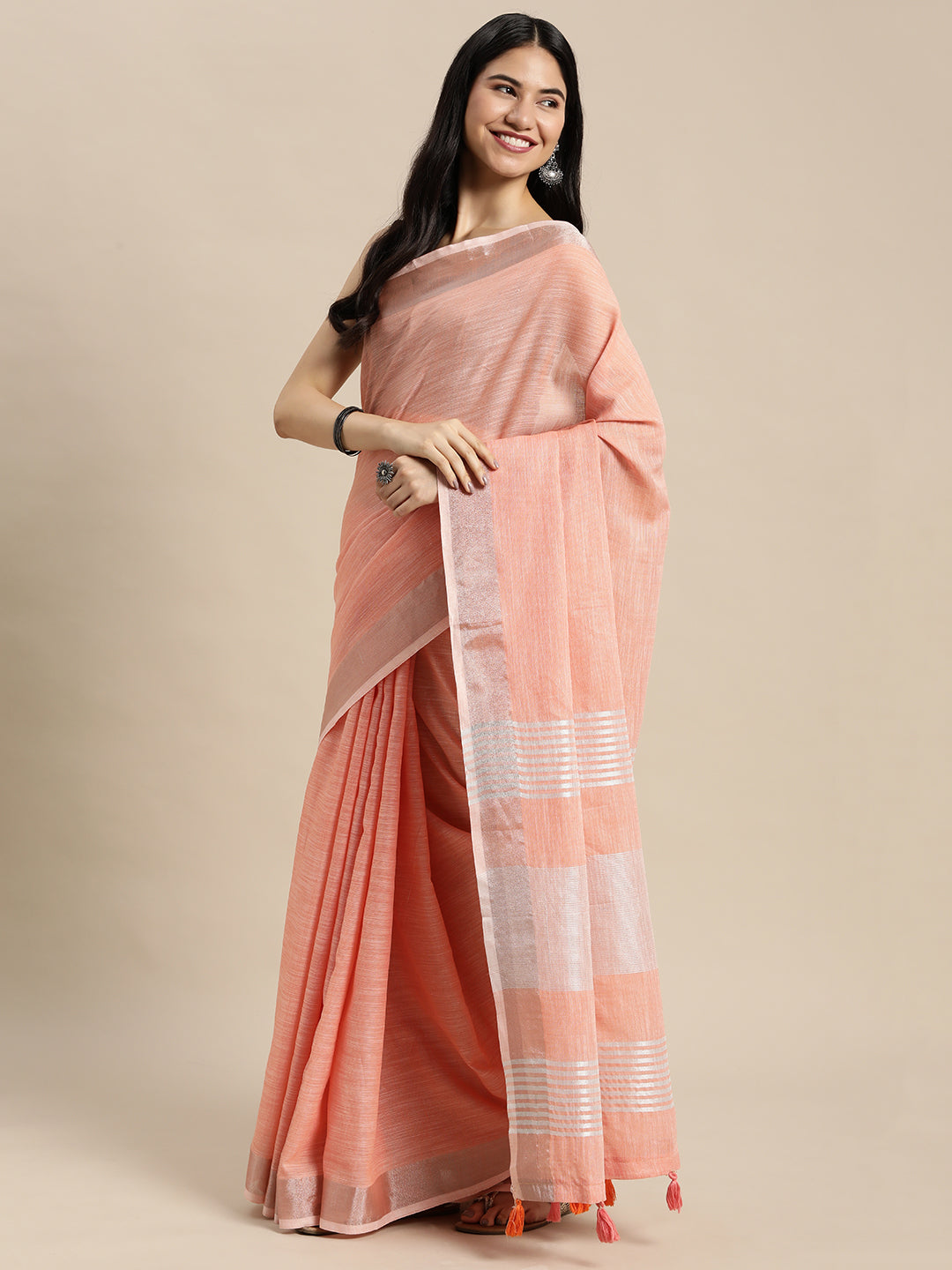 Peach Linen Saree with Contrast Zari Border and Tassels