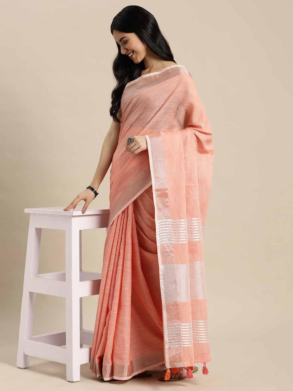 Peach Linen Saree with Contrast Zari Border and Tassels