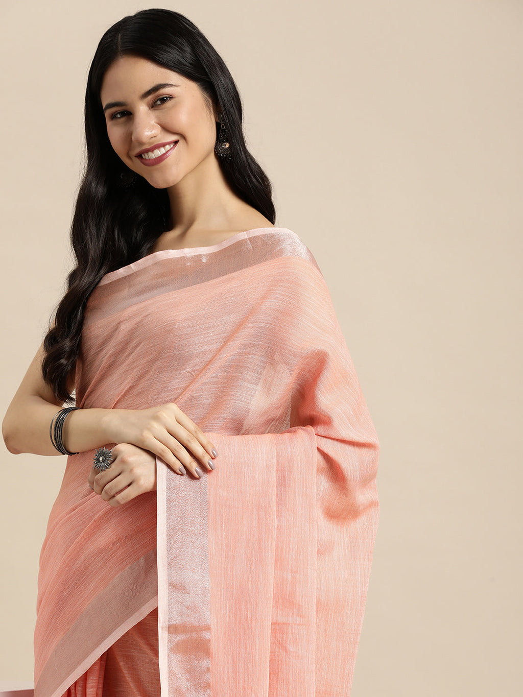 Peach Linen Saree with Contrast Zari Border and Tassels