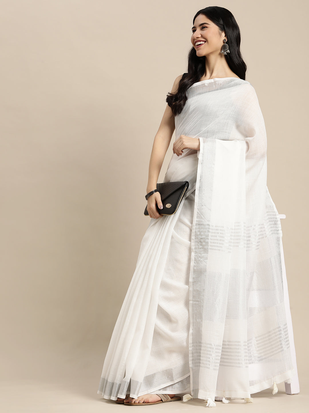 Elegant White Woven Linen Saree with Contrast Zari Border and Tassels
