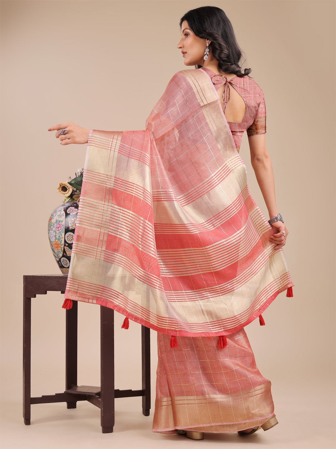 Peach Organza Saree with Woven Zari Work and Tassel Detail
