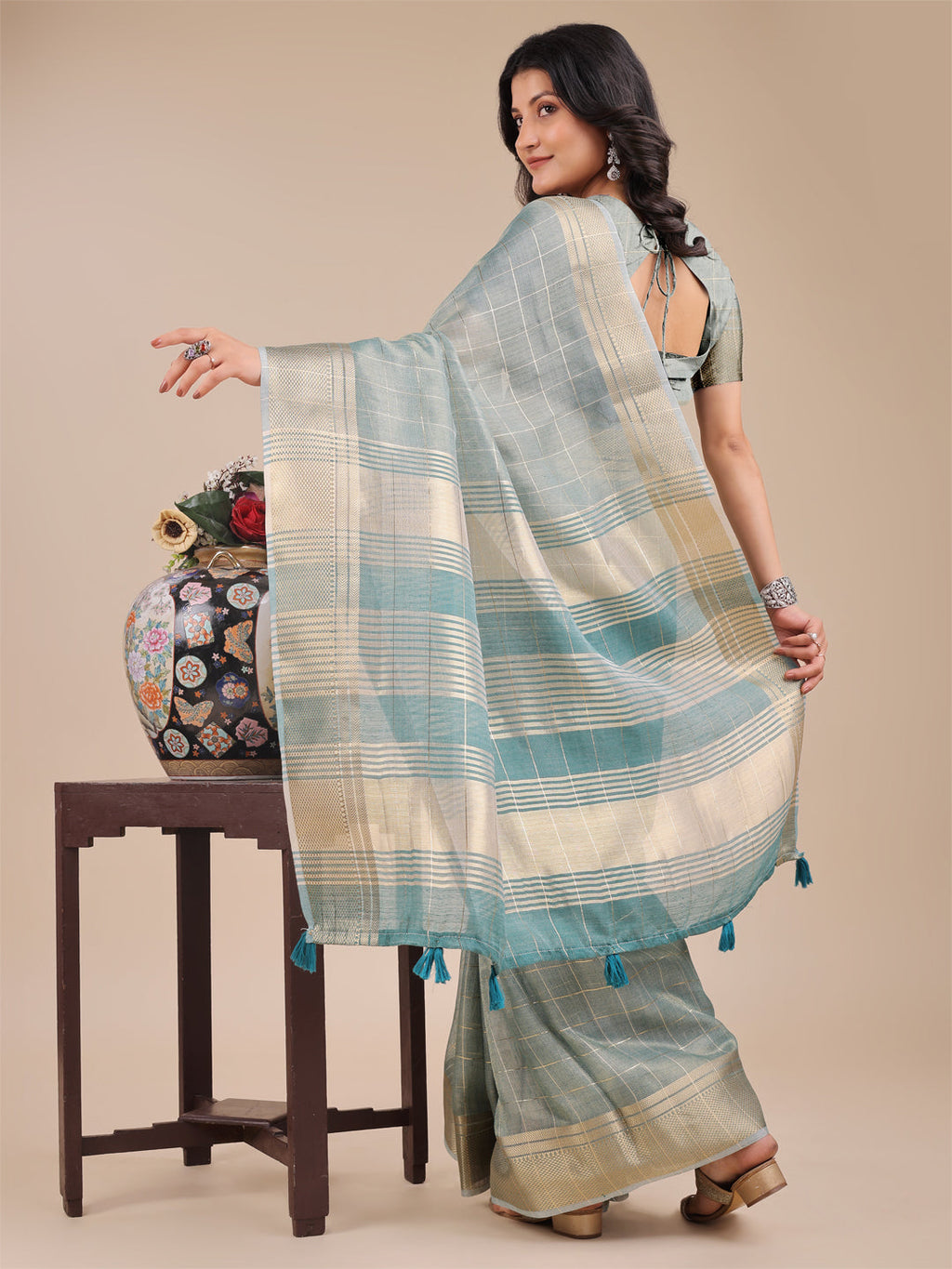 Sea Green Organza Saree with Woven Zari Work and Tassel Detail
