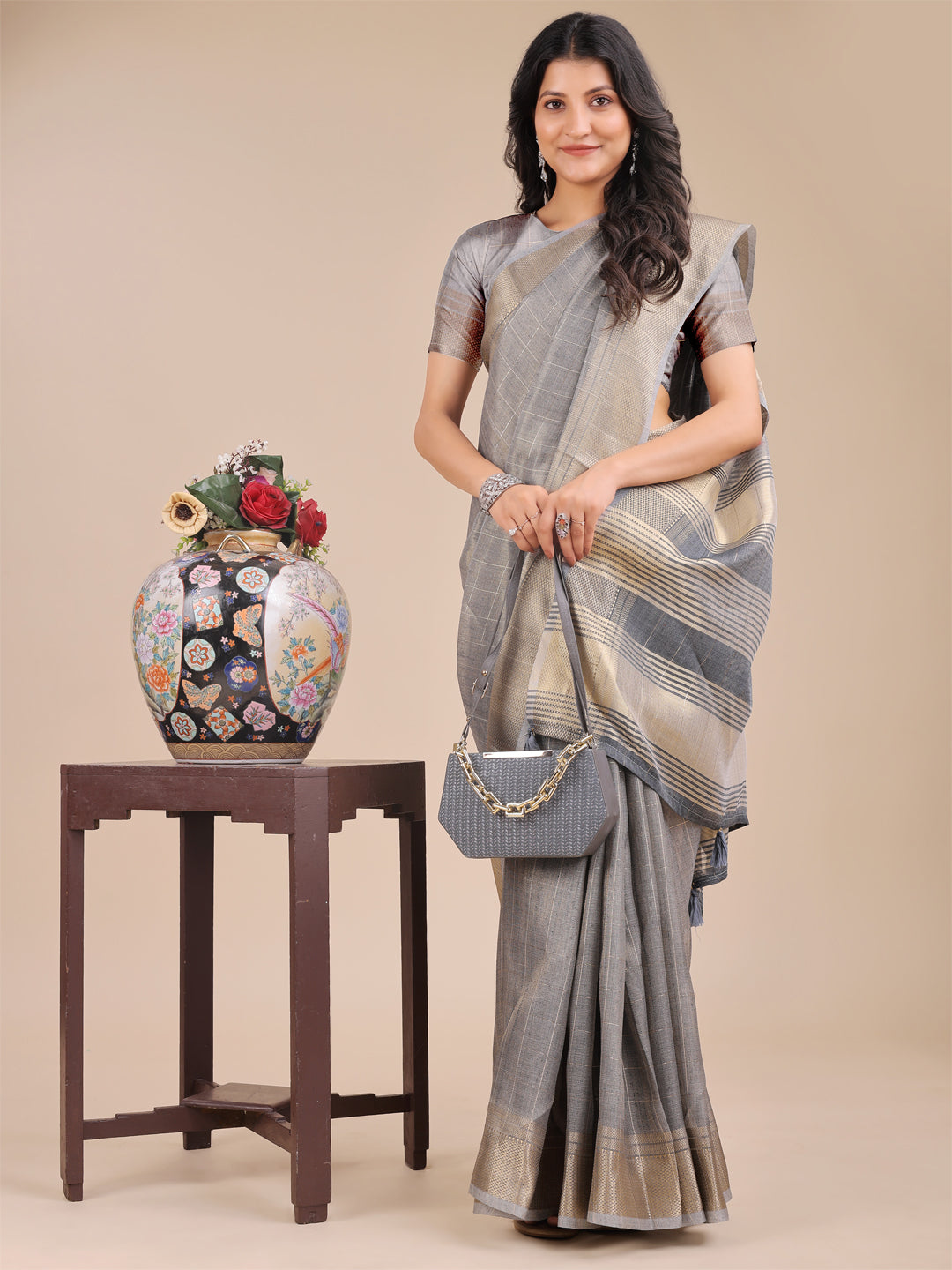 Grey Organza Saree with Woven Zari Work and Tassels