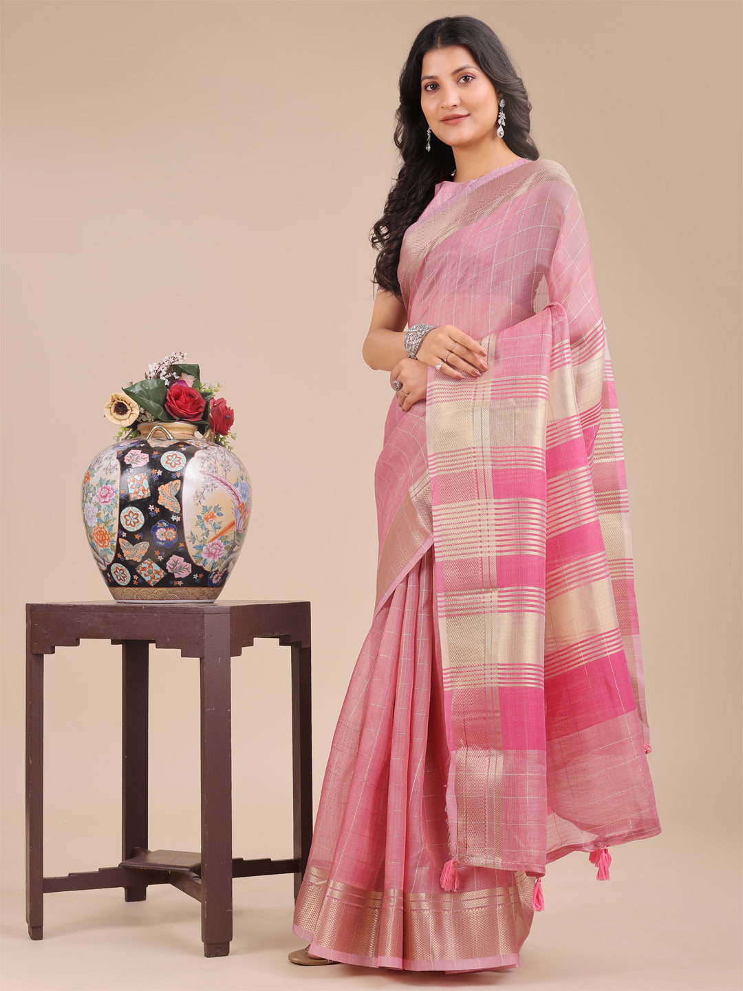 Pink Organza Saree with Woven Zari Work and Tassel Details