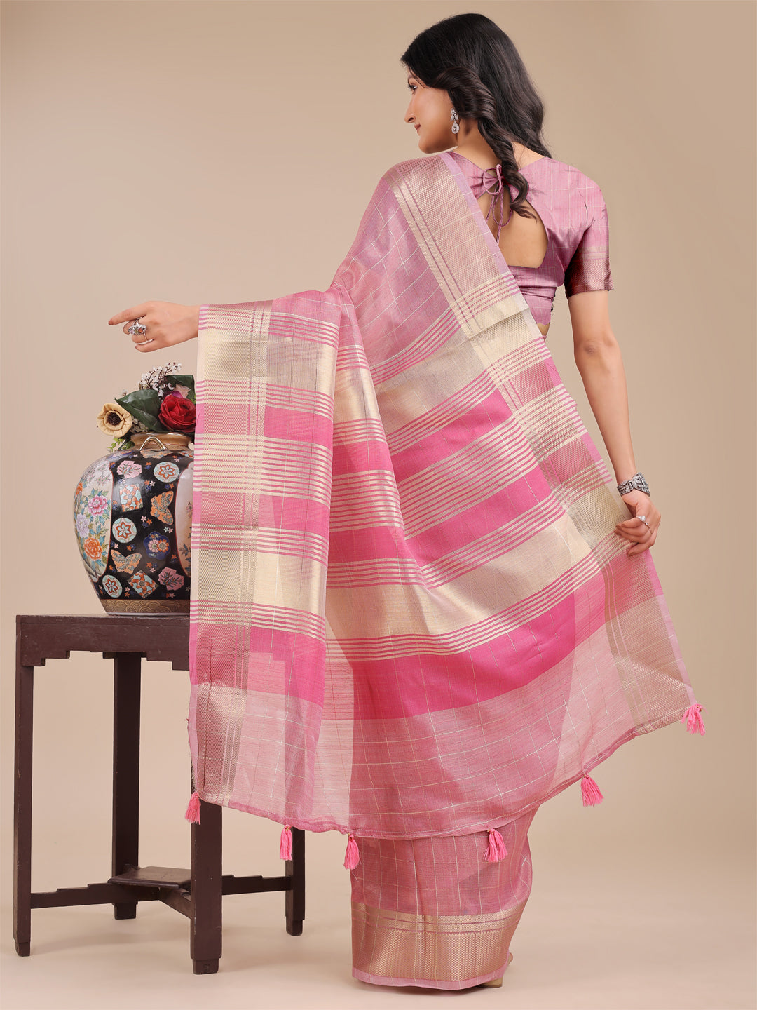 Pink Organza Saree with Woven Zari Work and Tassel Details