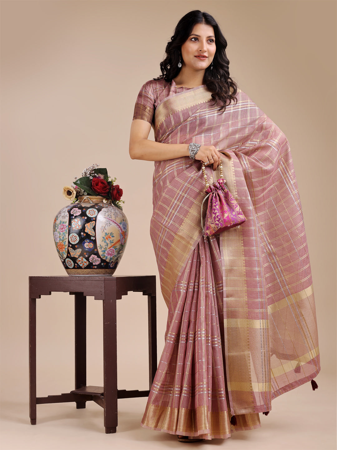 Purple Organza Saree with Woven Zari Work and Tassel Details