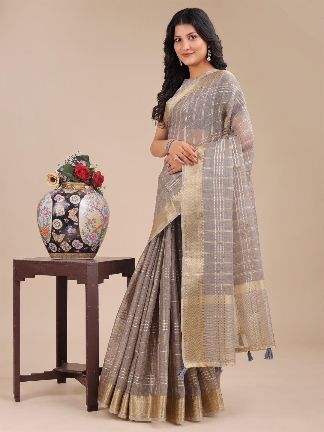 Tan Organza Saree with Woven Zari Work and Tassel Detail