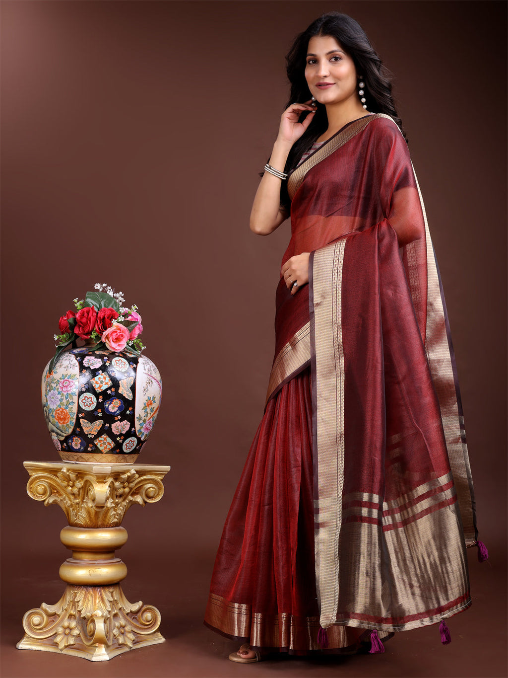 Red Organza Saree with Woven Zari Work and Traditional Tassels