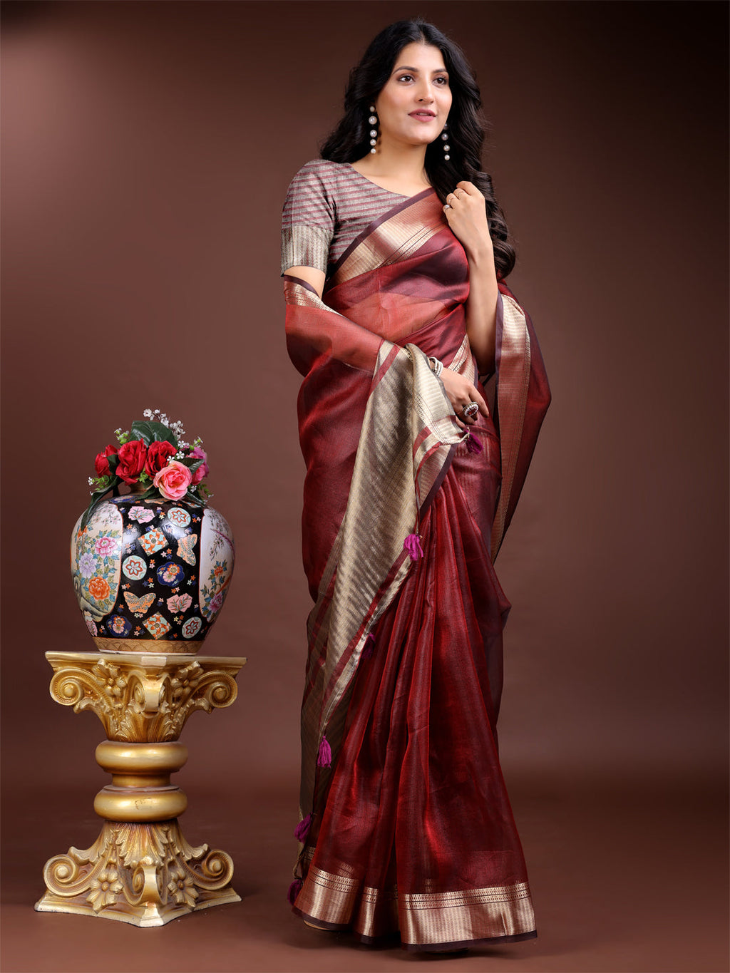 Red Organza Saree with Woven Zari Work and Traditional Tassels